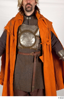  Photos Medieval Knight in cloth armor 2 Knight Medieval clothing gambeson orange cloak upper body 0001.jpg